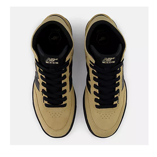 Top view of a pair of New Balance 440 mid top shoes in tan and black on a white background. 