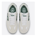 Top view of a white Etnies Locut Andy Anderson shoe with green E and the text etnies.