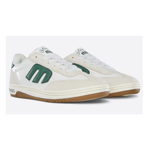 Side angle view of a white Etnies Locut Andy Anderson shoe with green E and the text etnies.