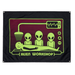Alien Workshop skateboards cloth banner featuring drawing of their abduction scanner graphic of 3 aliens scanning a human body in colors or neon green, maroon and black. 