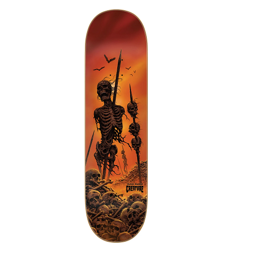 An orange and maroon Creature skateboard featuring an after battle scene of skeletons posted on pikes with several more skeletons piled on the ground and the word Creature. 