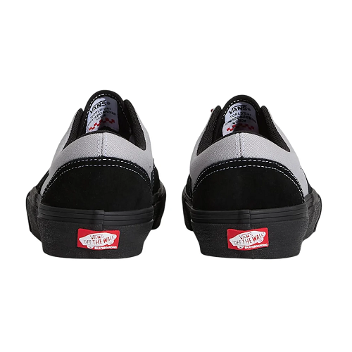 A pair of Vans Era sneakers shown from the back, featuring a black and light gray colorway with a black sole and red Vans logo patches on the heel.
