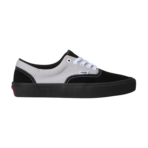 A side view of Vans Era sneaker in black and light gray canvas with white laces, shown from a side profile view against a plain white background.