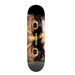 A skateboard deck featuring a graphic print of two wide-open eyes looking upward, with the word 'MADNESS' printed vertically in yellow near the center, shown against a black background.