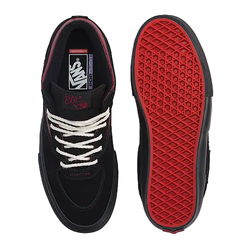 A pair of black Vans Cloudfoam skate shoes shown from the top and bottom. The shoes feature white laces, red stitching, a red textured outsole, and a black Vans logo on the tongue.