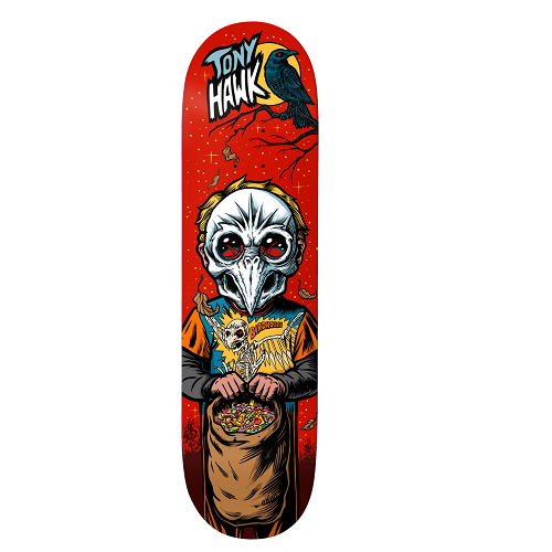 A red Birdhouse skateboard with halloween theme of a kid trick or treating with a hawk skull mask and the text Tony Hawk. 