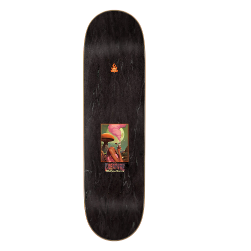 Top of a black stained skateboard with a psyadelic picture of a mushroom, moon, woman with no head smoking a cigarette with pink smoke and the words Creature Mathias Torres. 