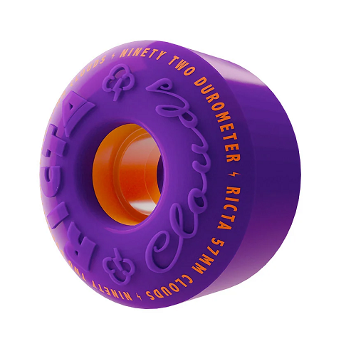 Side angle view of a purple Ricta wheel with orange core.