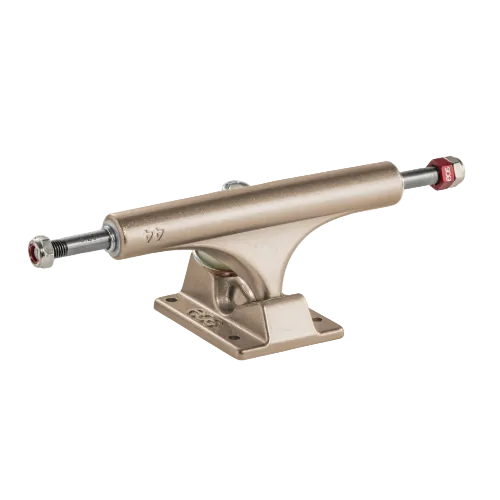 Skateboard truck with gold finish on a white background