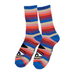 A pair of rainbow striped toy machine socks with stripes in pink, orange, tan and blue with a large eye on the toes. 