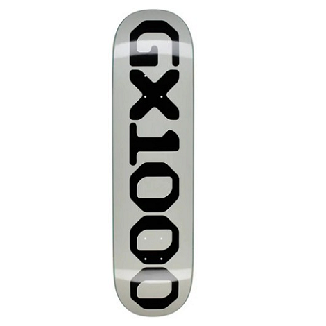A skateboard deck shown vertically against a plain white background, featuring a metallic grey background with bold black 'GX1000' lettering printed down the center.